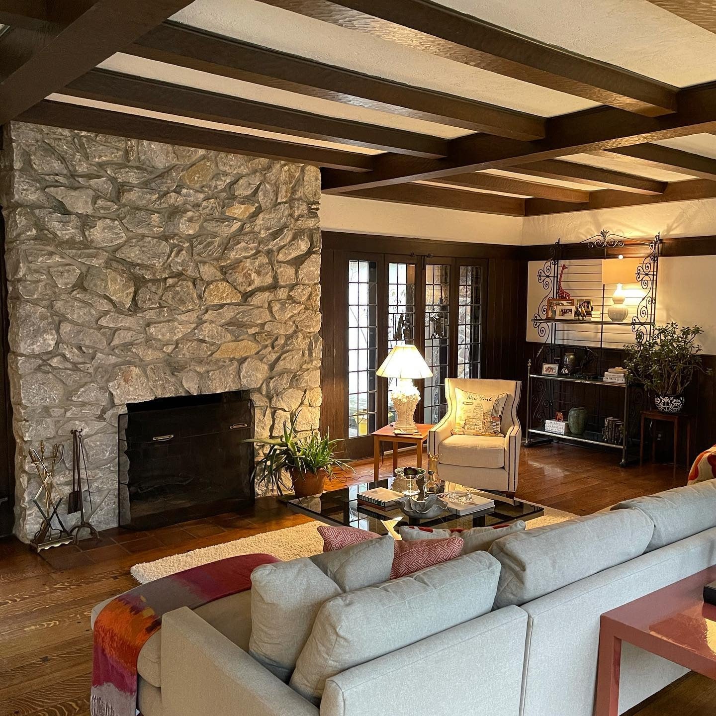 6. Vintage-Inspired Family Room with Taupe and Warm Wood (Stone Fireplace Living Room Ideas)