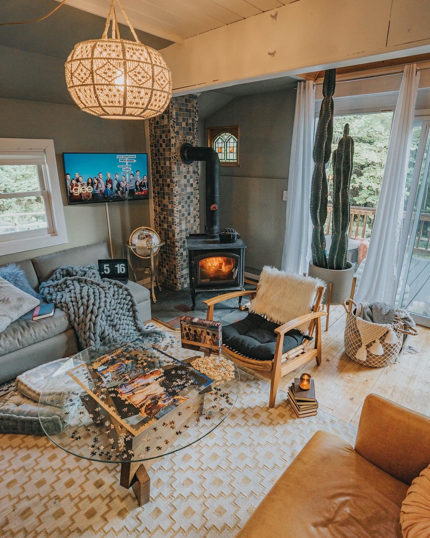 4. Cozy Cabin Corner with Soft Grays, Leather Warmth & Textured Layers (Cabin Living Room Ideas)