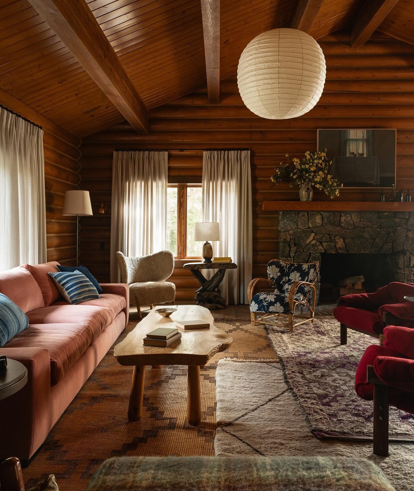8. Warm Log Cabin Living Room with Soft Furnishings & Collected Textiles (Cabin Living Room Ideas)