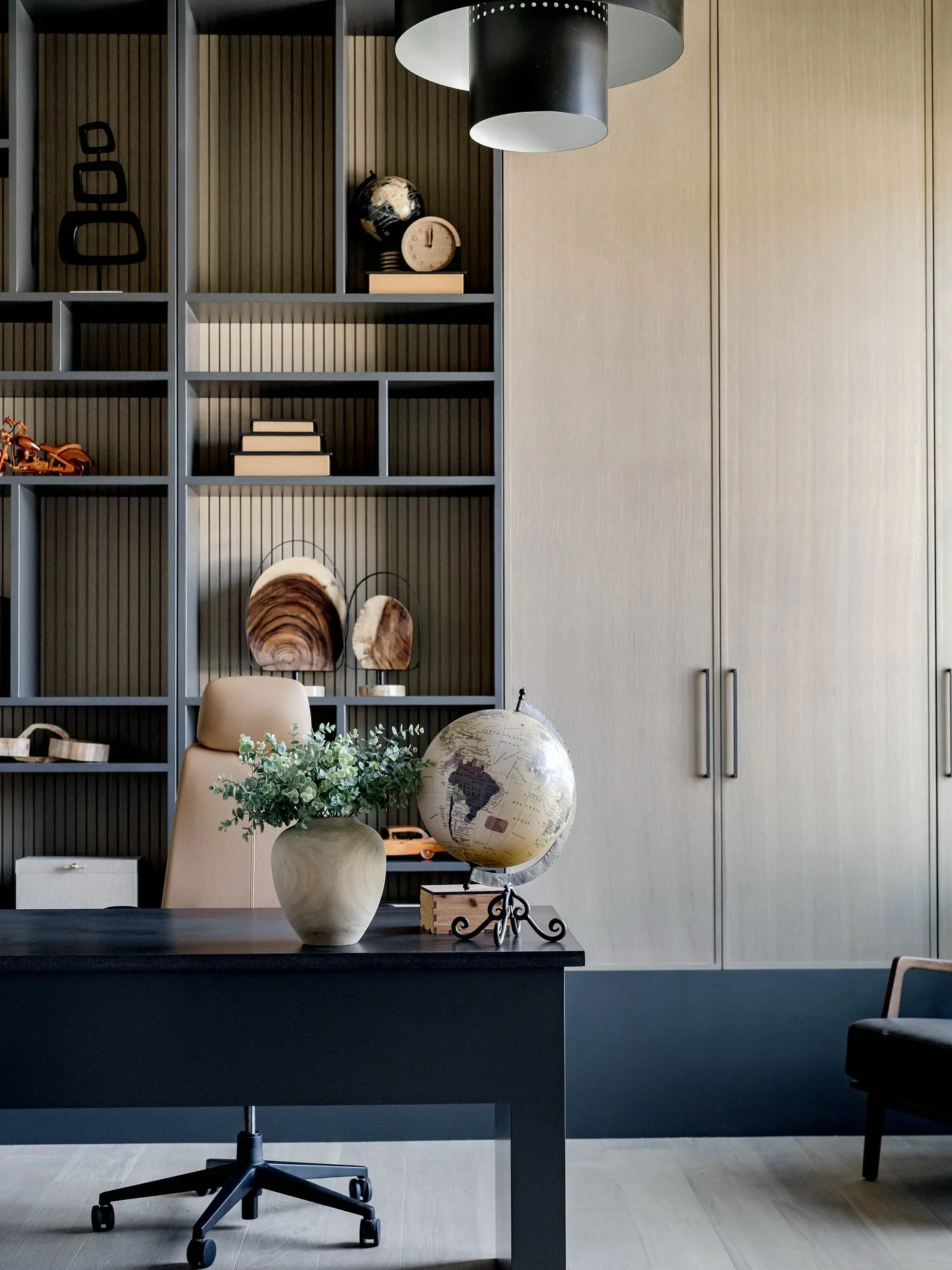 4. Soft Grey Cabinetry with a Minimal Black Worktable (Black Desk Office Ideas)