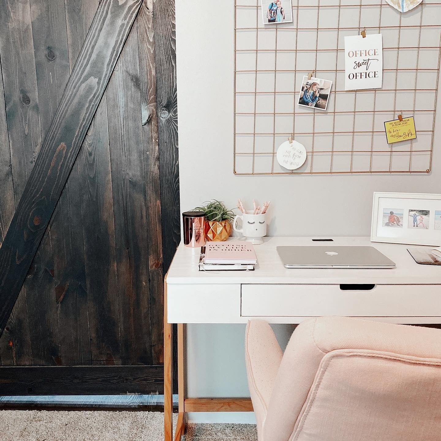 4. Cozy Grid-Wall Desk in Blush and Warm Wood (Tiny Home Office Ideas)