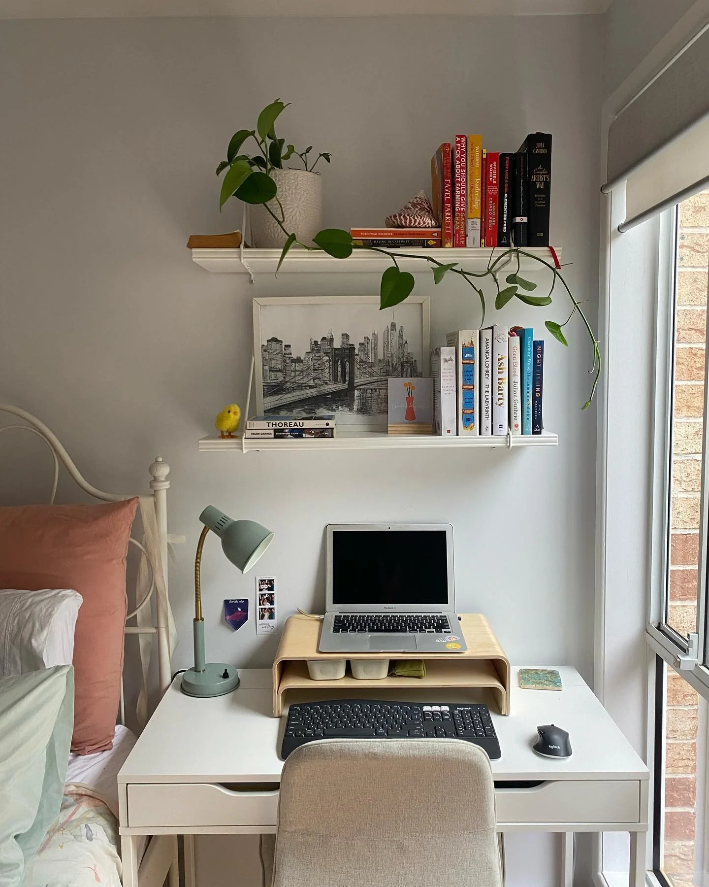 7. Simple Desk Nook with Warm Neutrals and Cascading Greenery (Tiny Home Office Ideas)