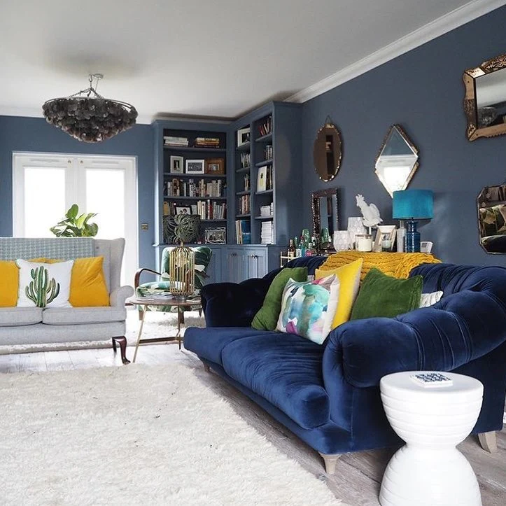 6. Vibrant Navy and Colorful Mix Living Area (Navy Blue Living Room Ideas)