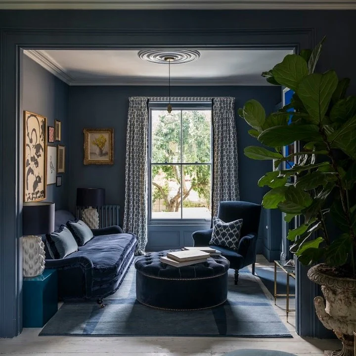 11. Moody Navy Lounge with Layered Textures (Navy Blue Living Room Ideas)