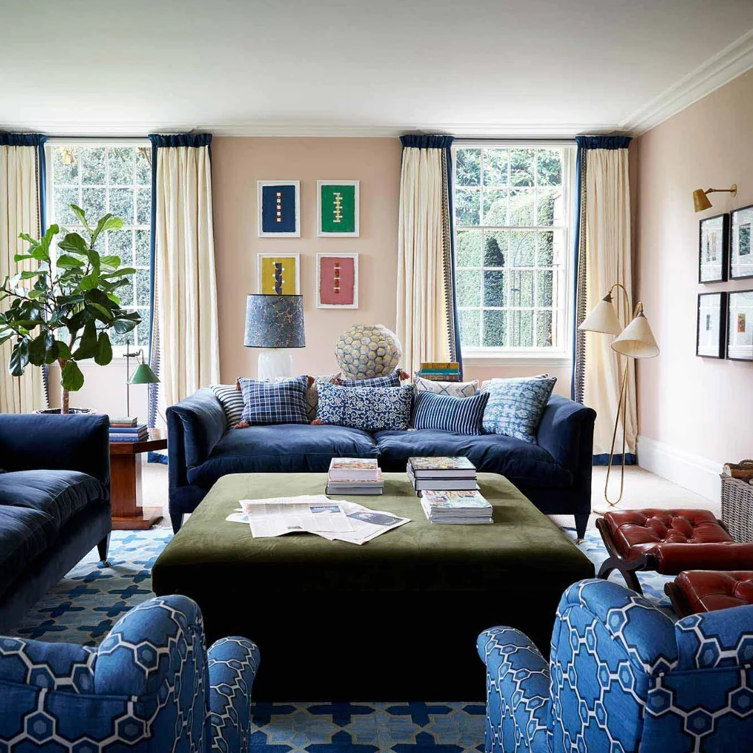 8. Pattern-Rich Navy Seating Room with Soft Pastels (Navy Blue Living Room Ideas)
