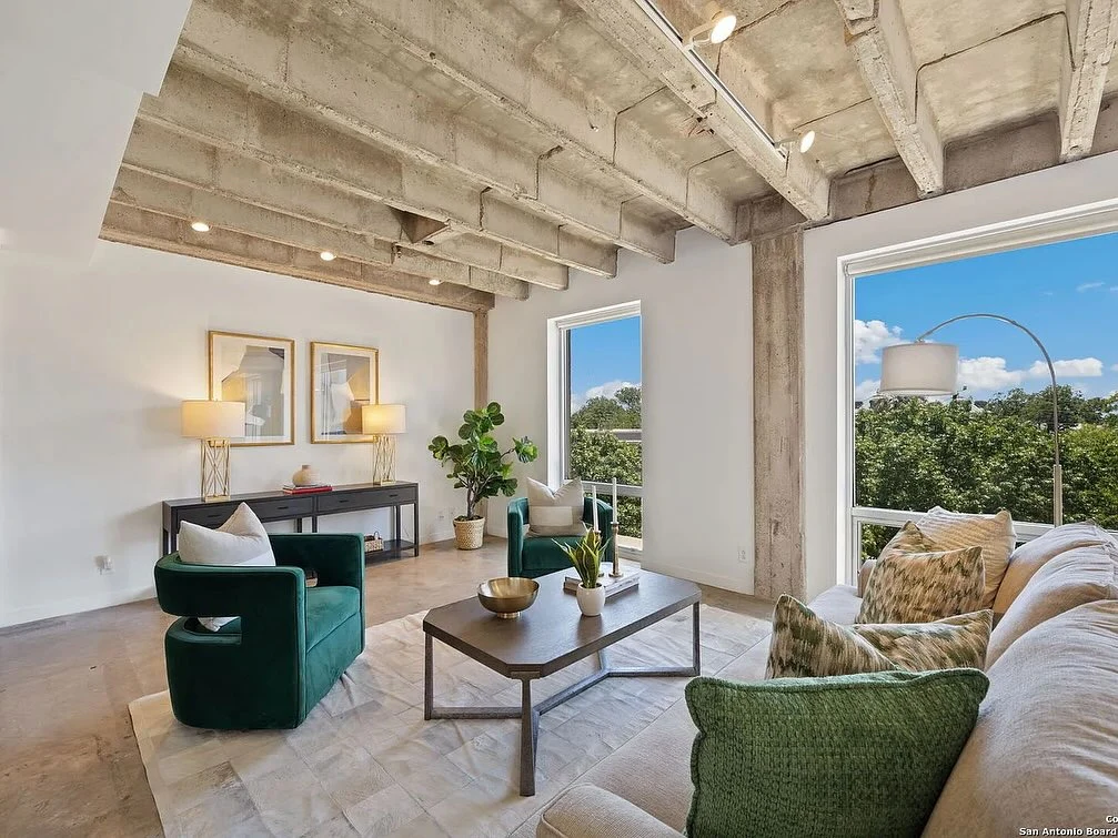 6. Industrial-Modern Loft with Emerald Seating (Urban Living Room Ideas)