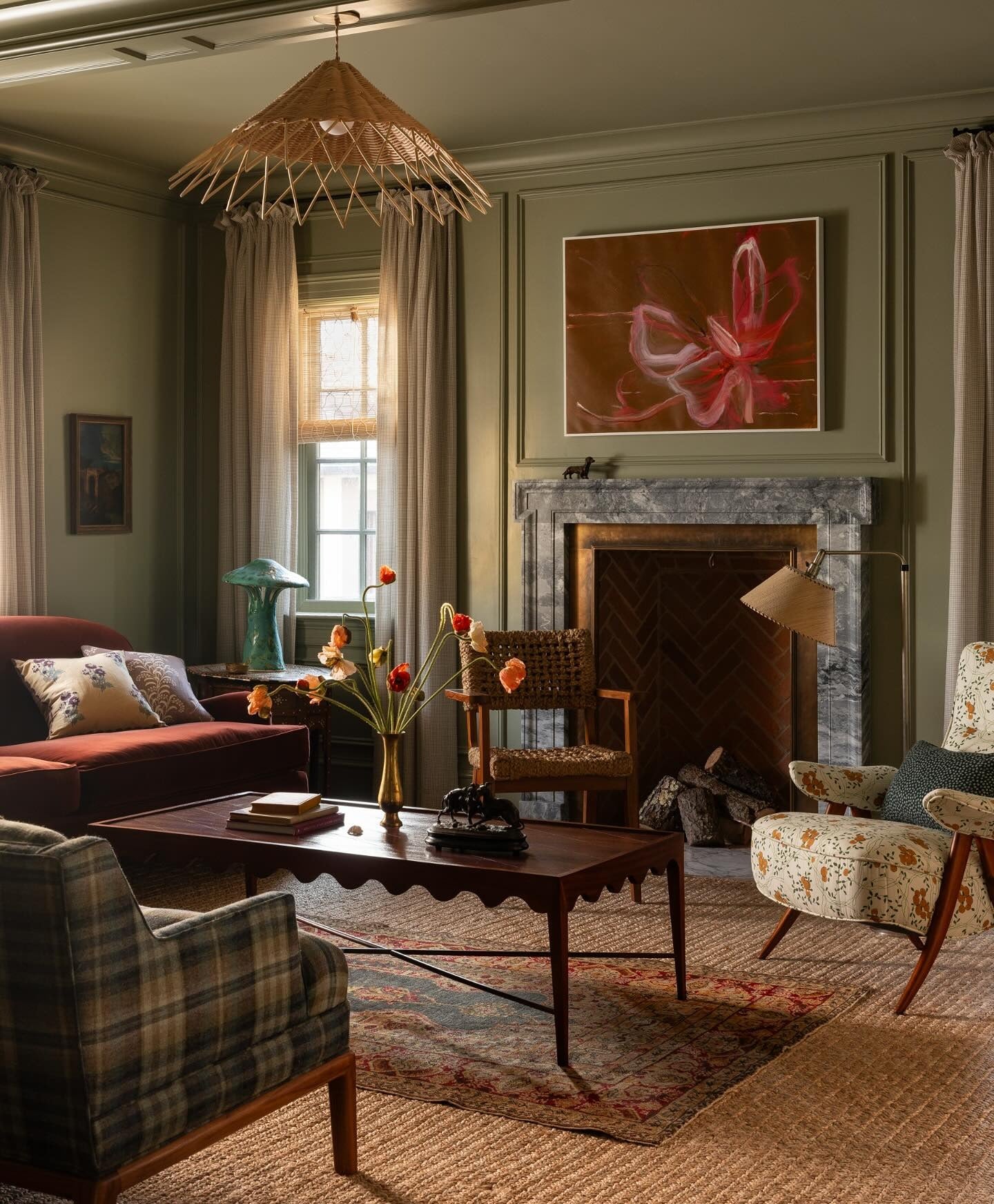 11. Moss Green Millwork with Earthy Patterned Seating (Masculine Living Room Ideas)