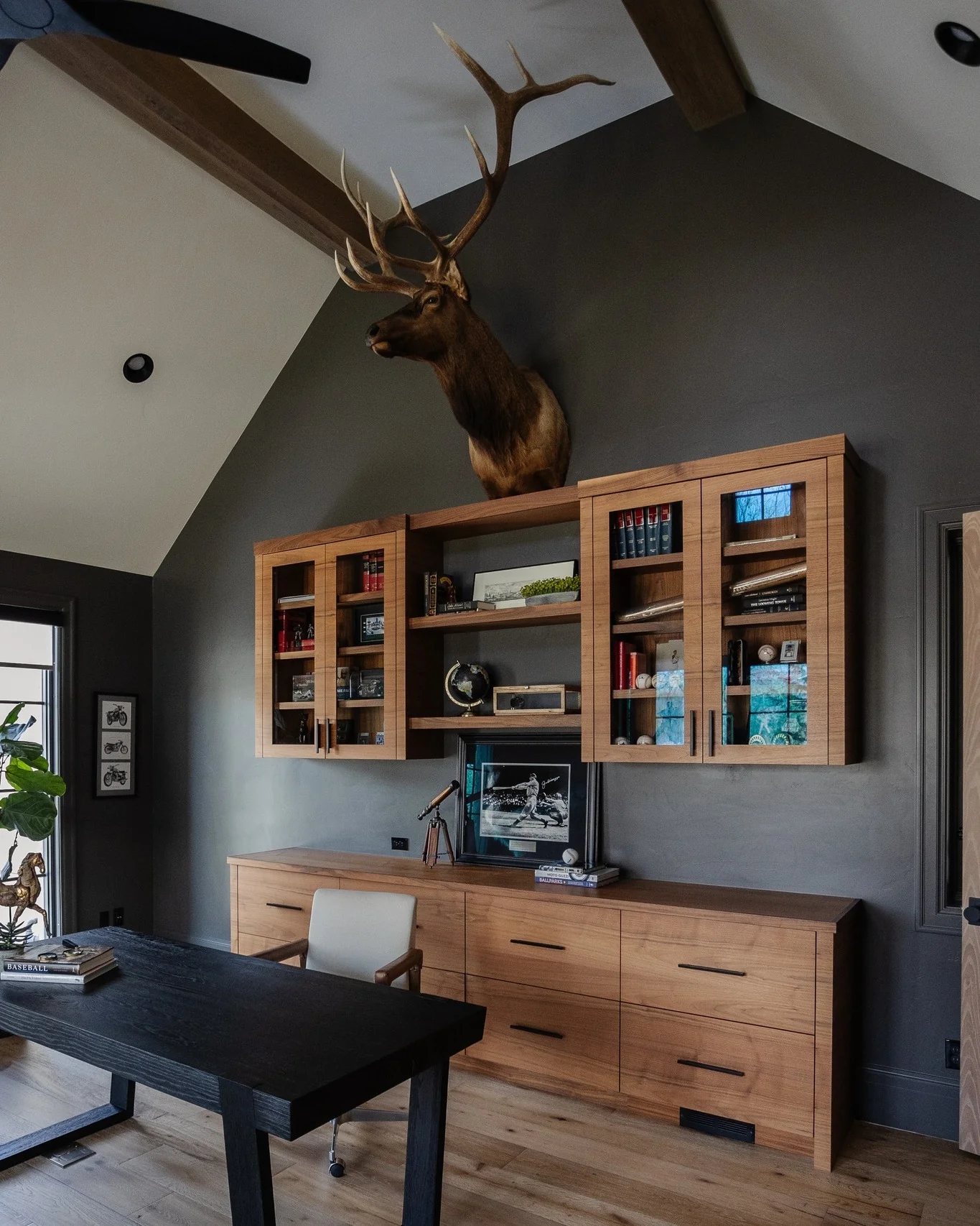 11. Charcoal Wall Office with Light Wood Cabinetry and Elk Mount (Rustic Office Ideas)