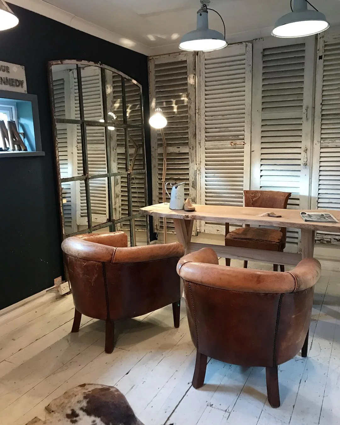 15. Distressed Shutter Office with Leather Club Chairs (Rustic Office Ideas)