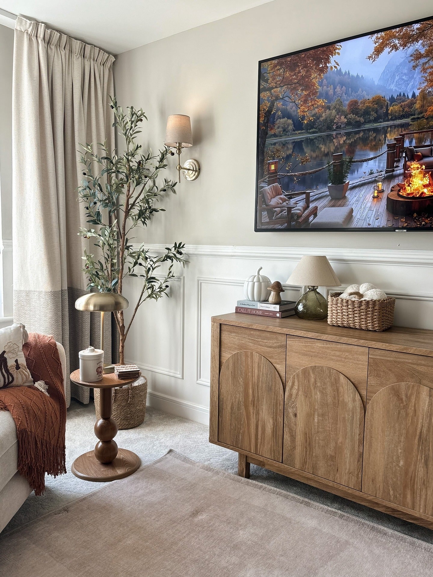 10. Warm Oak Accent Cabinet With Soft Neutrals (Living Room Tv Ideas)