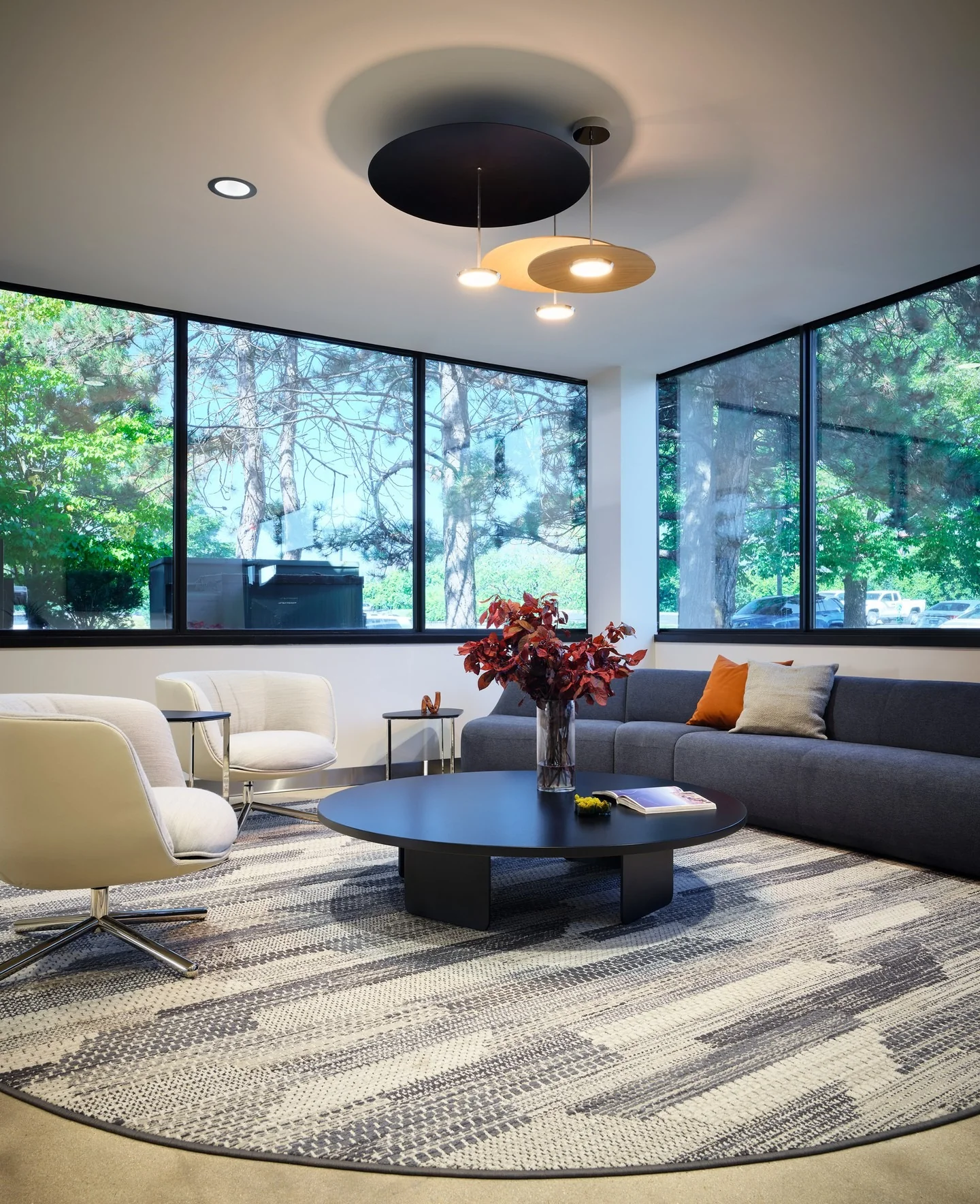 6. Sleek Workspace with Natural Light and Monochrome Palette (Lounge Office Room Ideas)