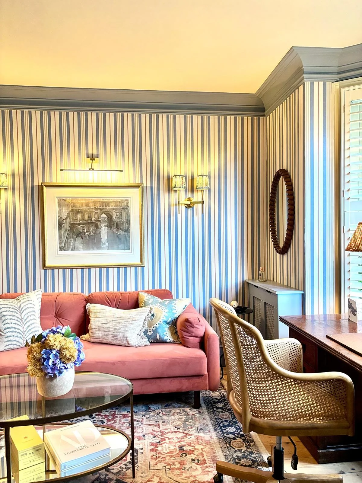 2. Striped Sophistication with Coral and Blue Accents (Lounge Office Room Ideas)