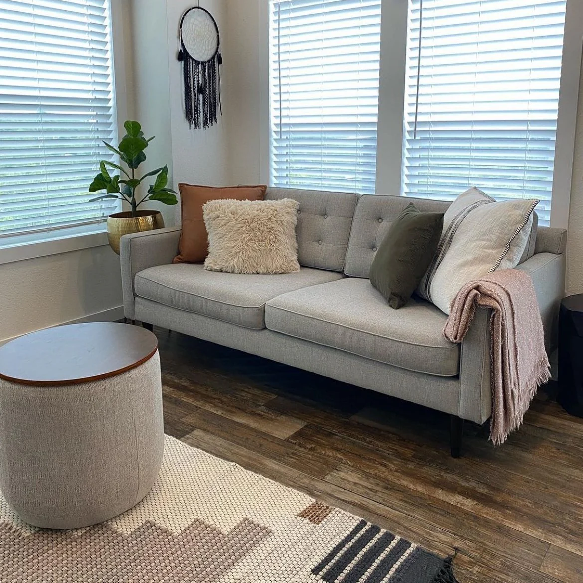 2. Scandinavian Comfort with Earthy Neutrals (Tiny House Living Room Ideas)