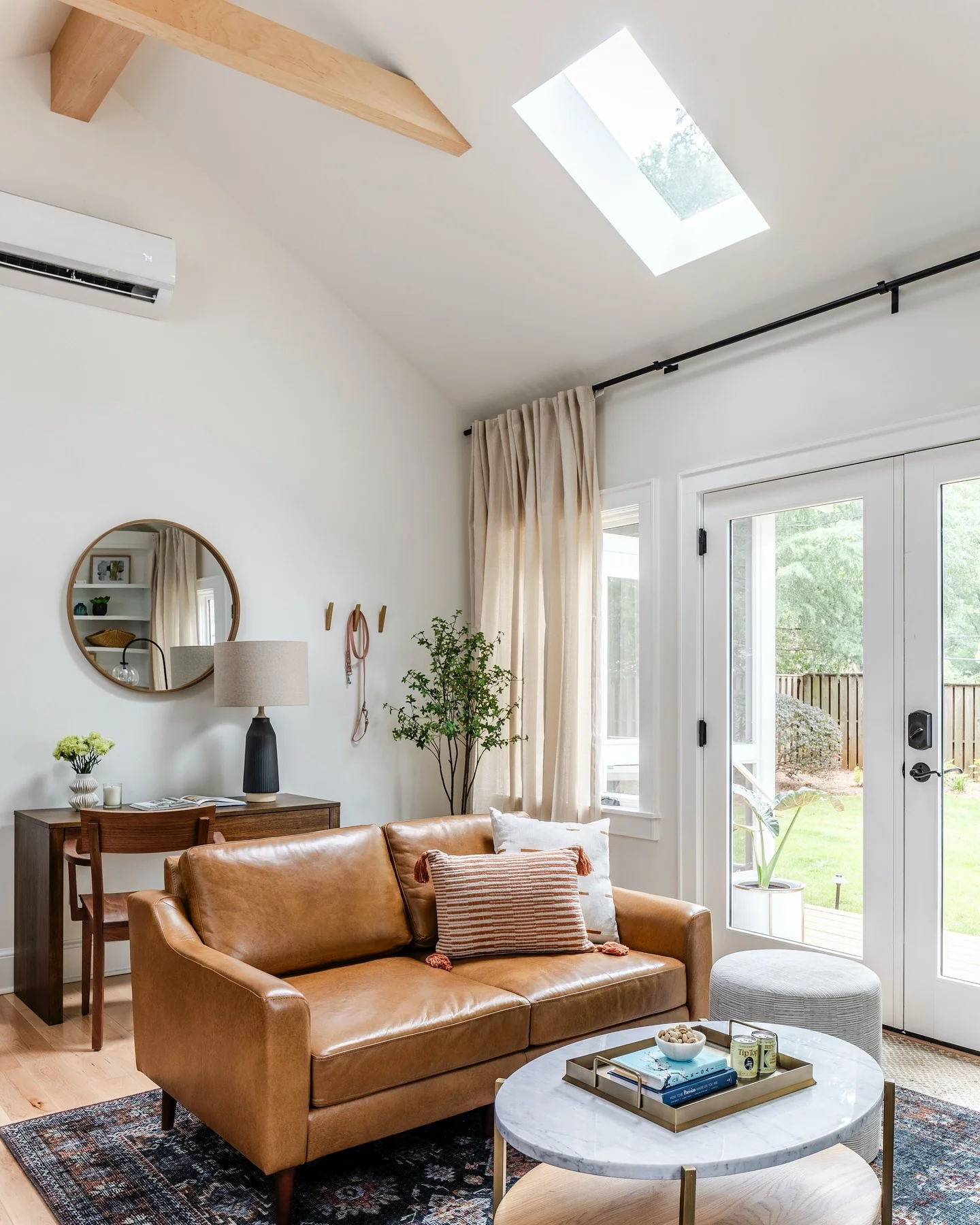 4. Mid-Century Natural Elegance (Tiny House Living Room Ideas)