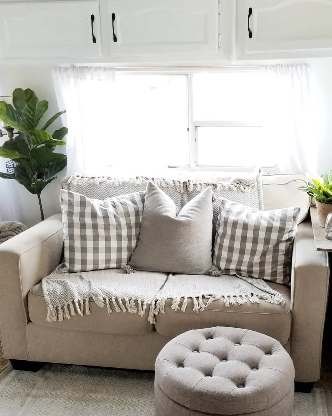 8. Country Charm with Cozy Simplicity (Tiny House Living Room Ideas)