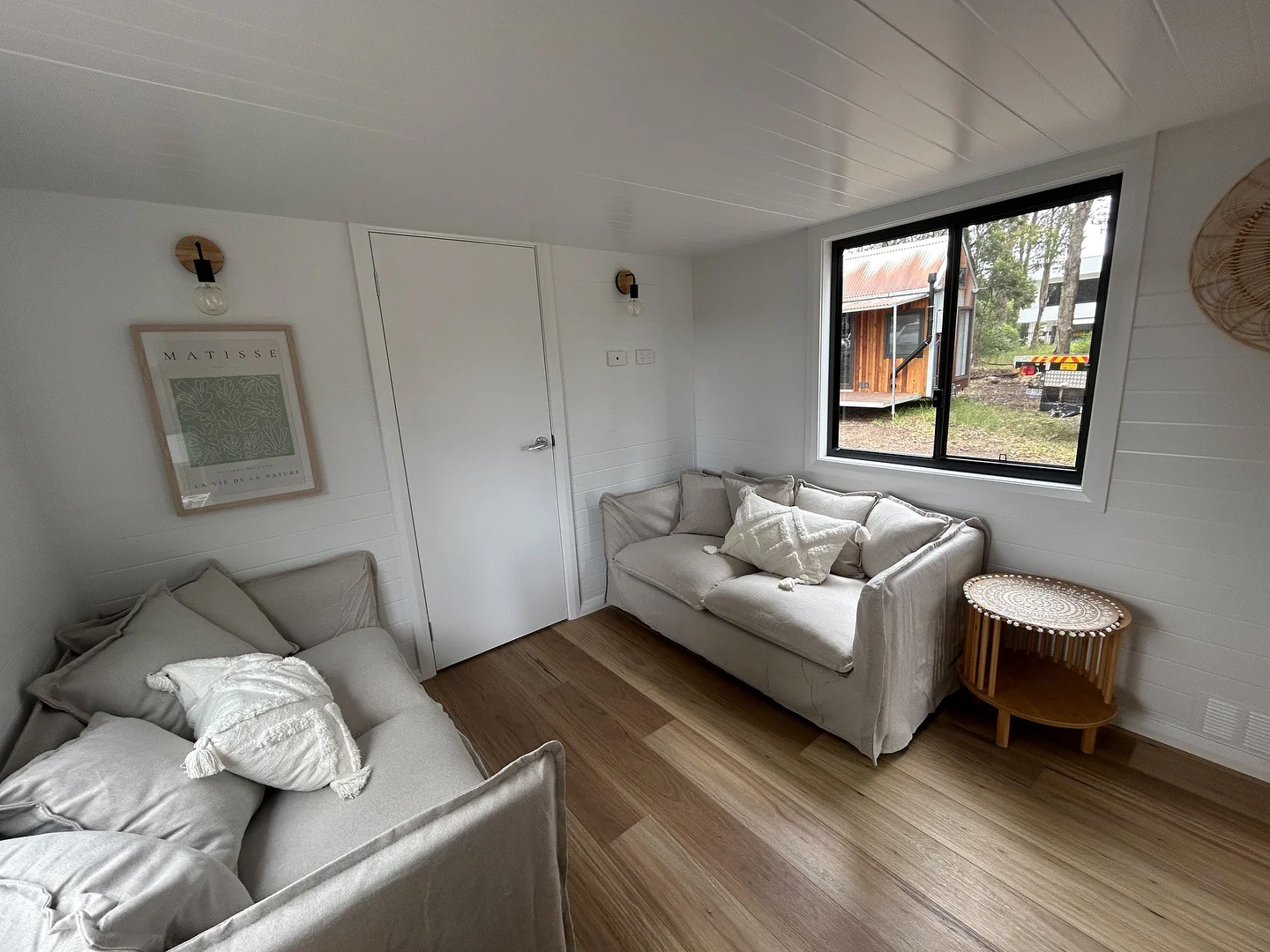 10. Soft Neutrals in Twin Harmony (Tiny House Living Room Ideas)