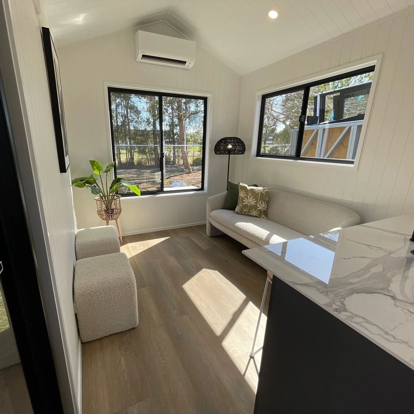 13. Minimal Coastal-Inspired Retreat (Tiny House Living Room Ideas)