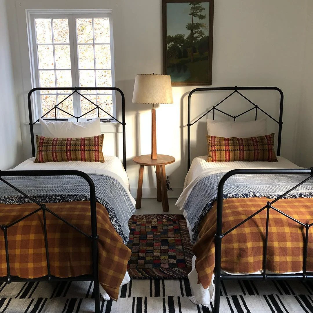 7. Sunny Twin Escape with Autumnal Plaid (Cabin Bedroom Ideas)