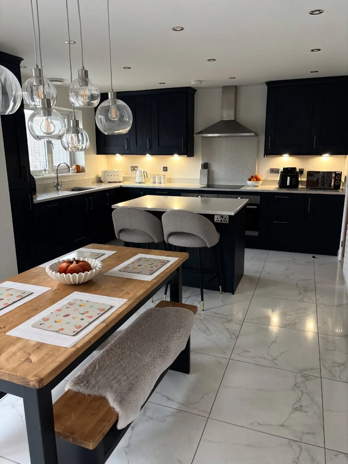 3. Modern Contrast with Industrial Touches (Small Kitchen Table Ideas)