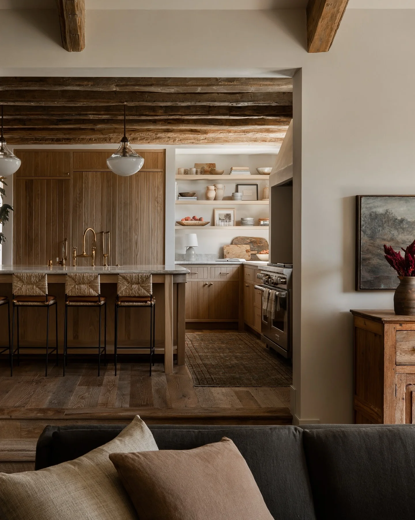 7. Rustic Refinement with Golden Accents (Kitchen and Living Room Ideas)