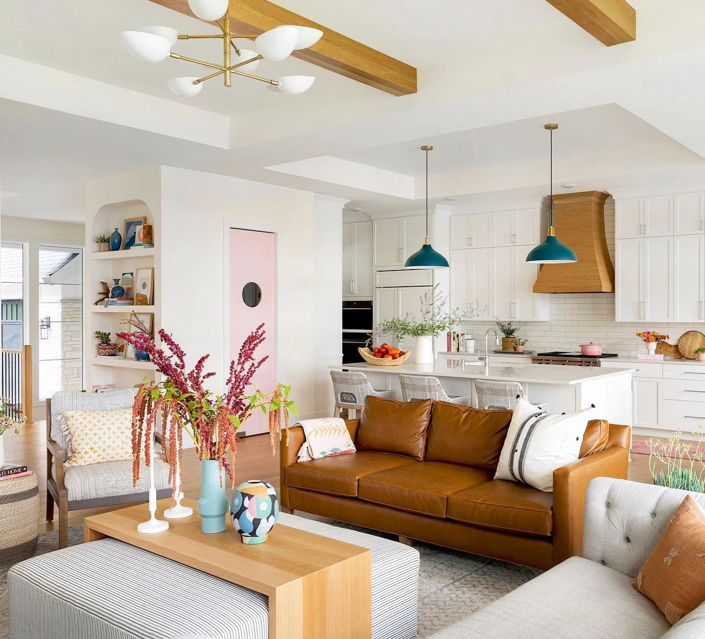 11. Playful Modern with Warm Leather and Teal Accents (Kitchen and Living Room Ideas)