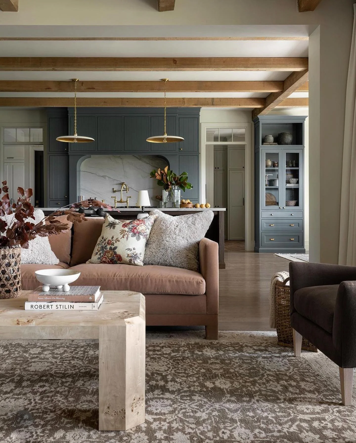 12. Classic Elegance with Moody Blue and Soft Taupe (Kitchen and Living Room Ideas)