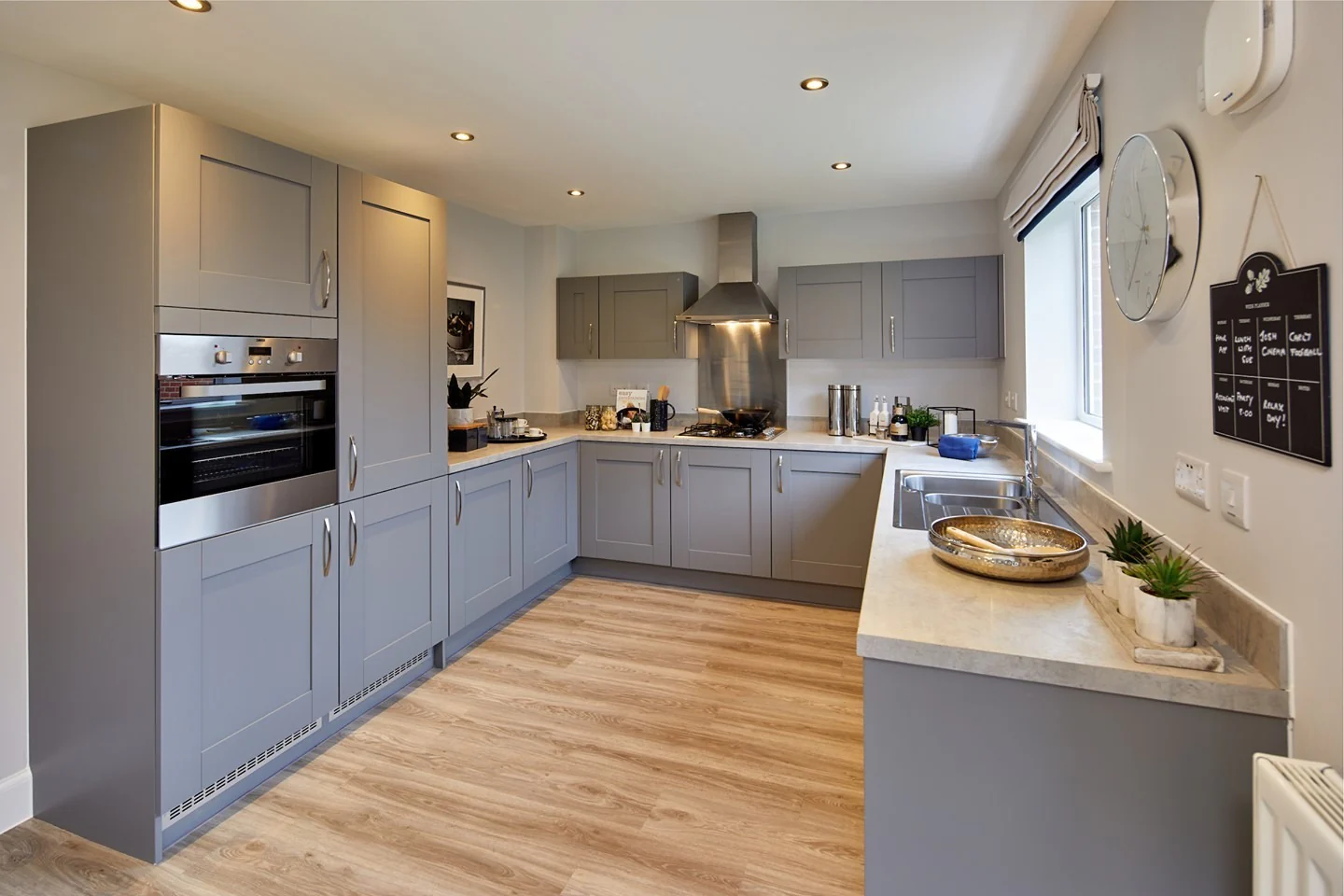 11. Stone Grey Simplicity with Warm Oak Flooring (Grey Kitchen Ideas)