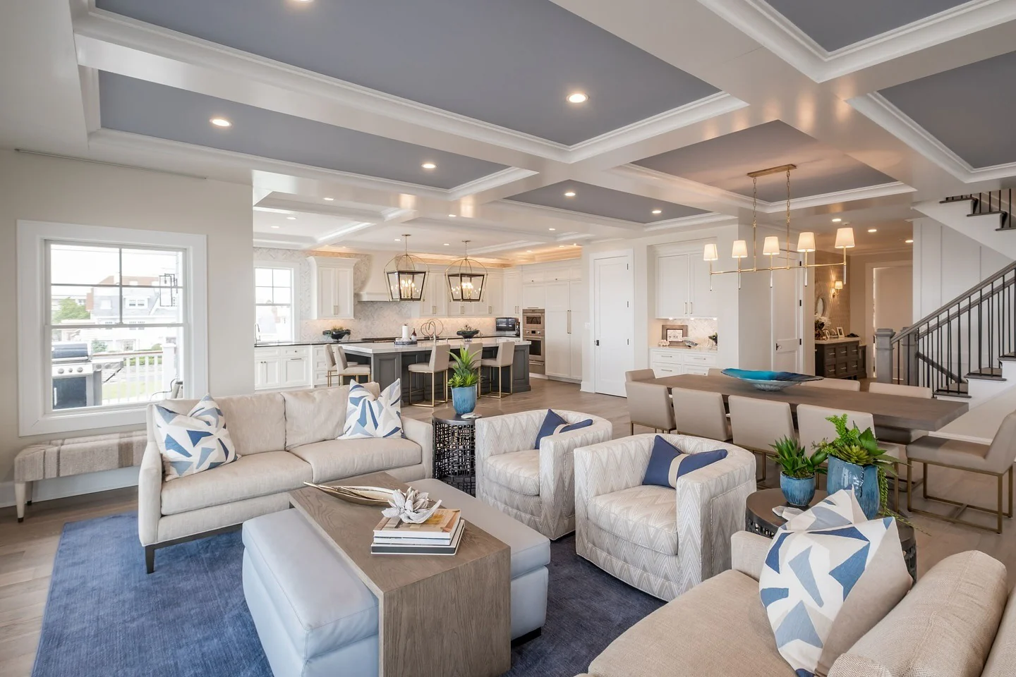3. Elegant Open-Concept Living with Blue Accents (Open Living Room Ideas)