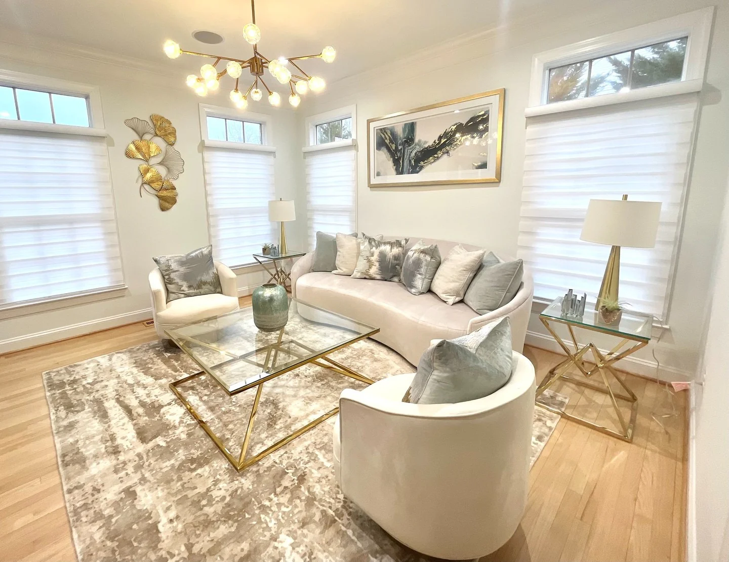 13. Modern Elegance in White and Brushed Gold (White and Gold Living Room Ideas)