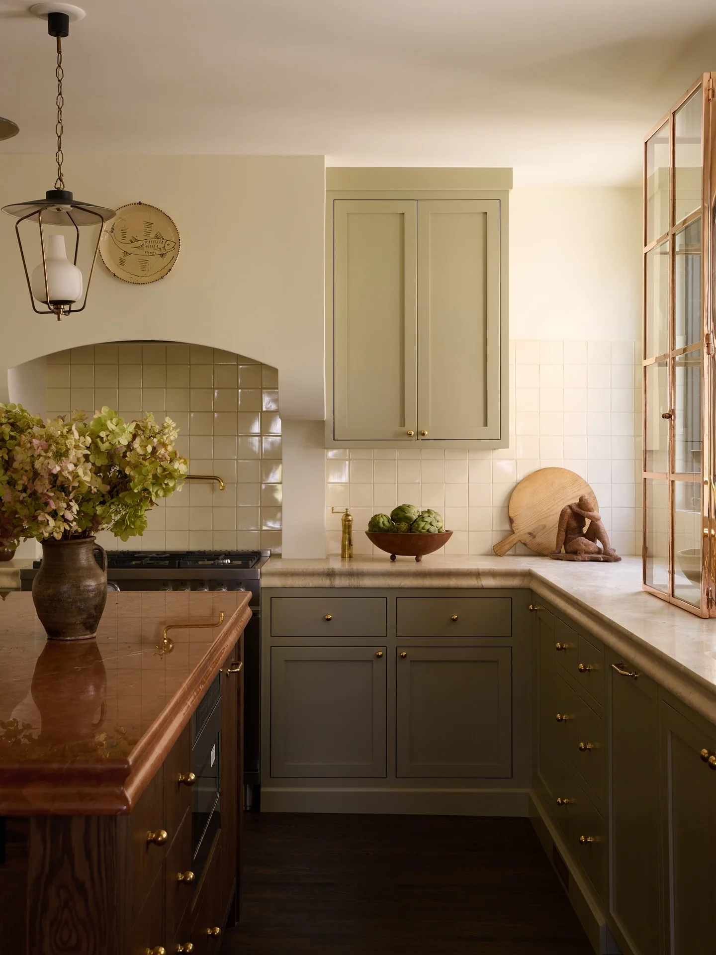 15. Moody Olive with Copper Warmth (Earth Tones Kitchen Ideas)