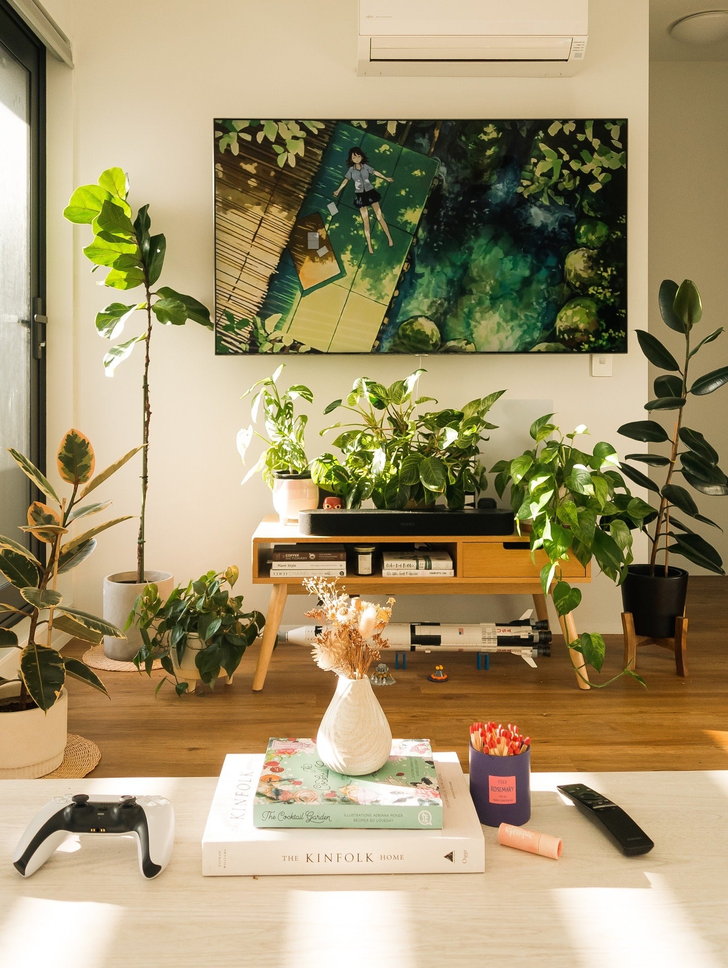 11. Natural Light and Modern Greens (Living Room Ideas with Indoor Plants)
