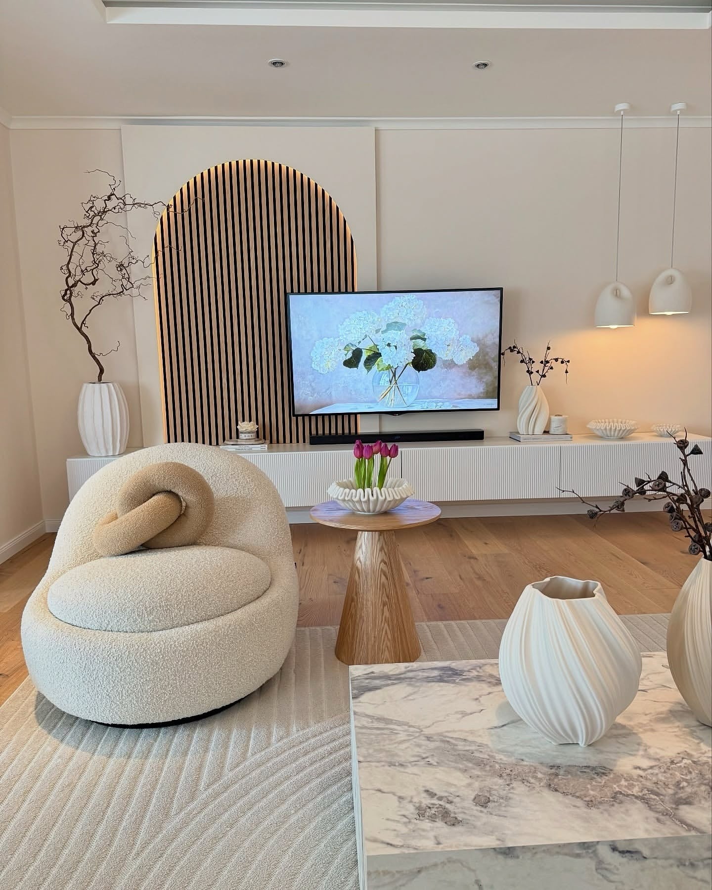 5. Sculptural Minimalism in Warm Creams (Light Living Room Ideas)