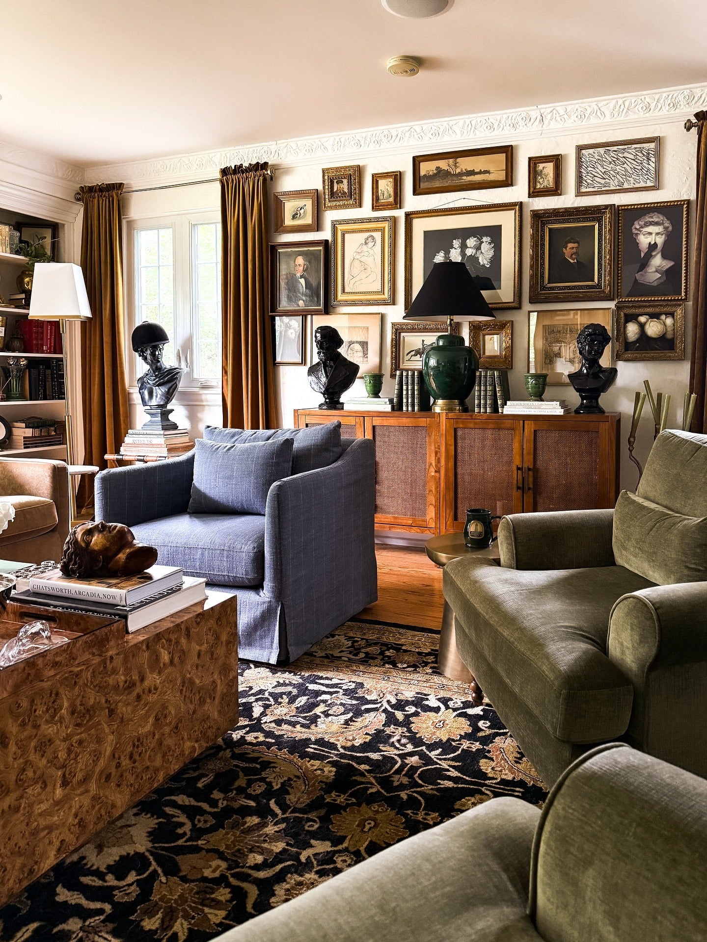 7. Library Charm with Artistic Depth (Traditional Living Room Ideas)