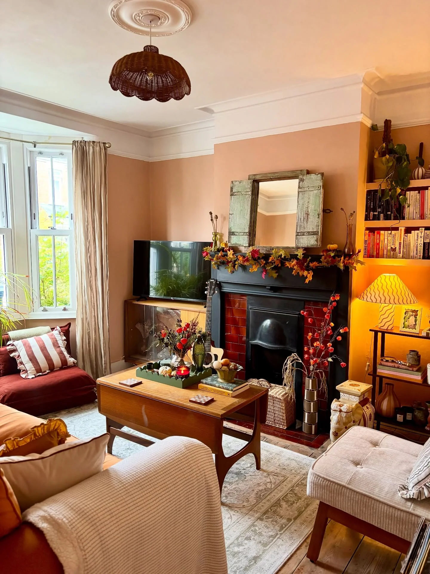 11. Autumn Glow with Warm Terracotta Walls (Traditional Living Room Ideas)