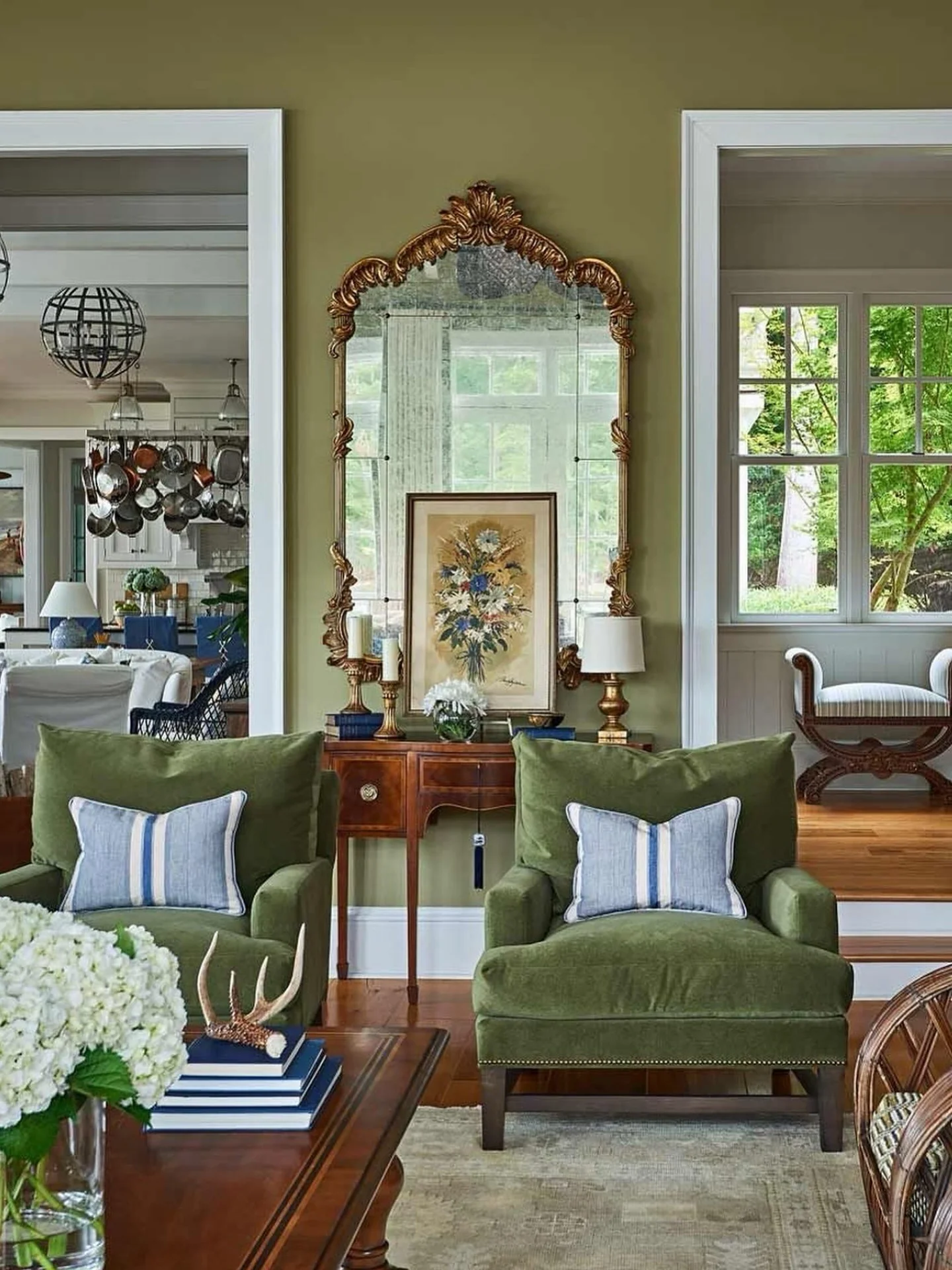 15. Olive Elegance with Classic Detailing (Traditional Living Room Ideas)