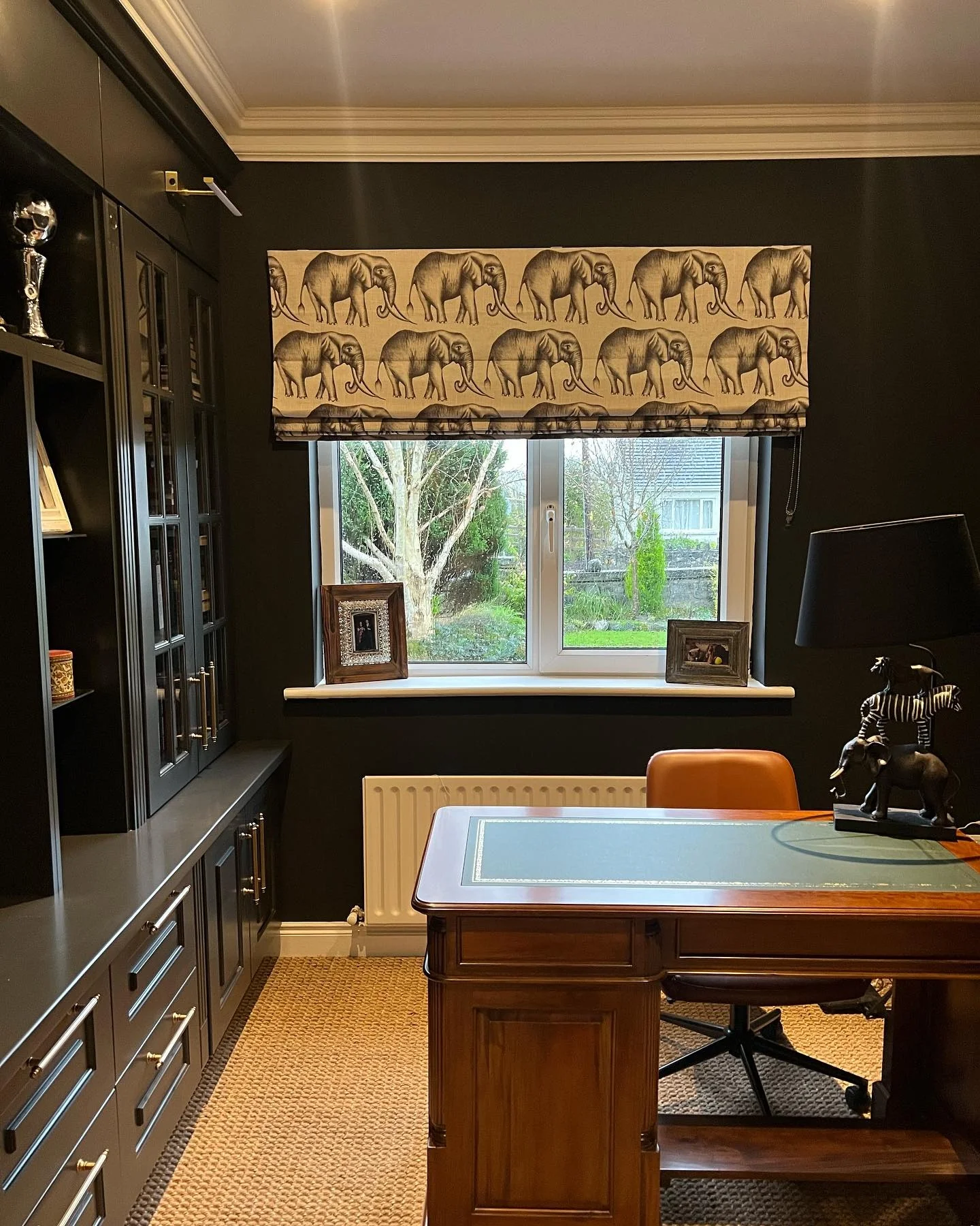 11. Elephant Motif Office with Classic Charm (Black Office Ideas)