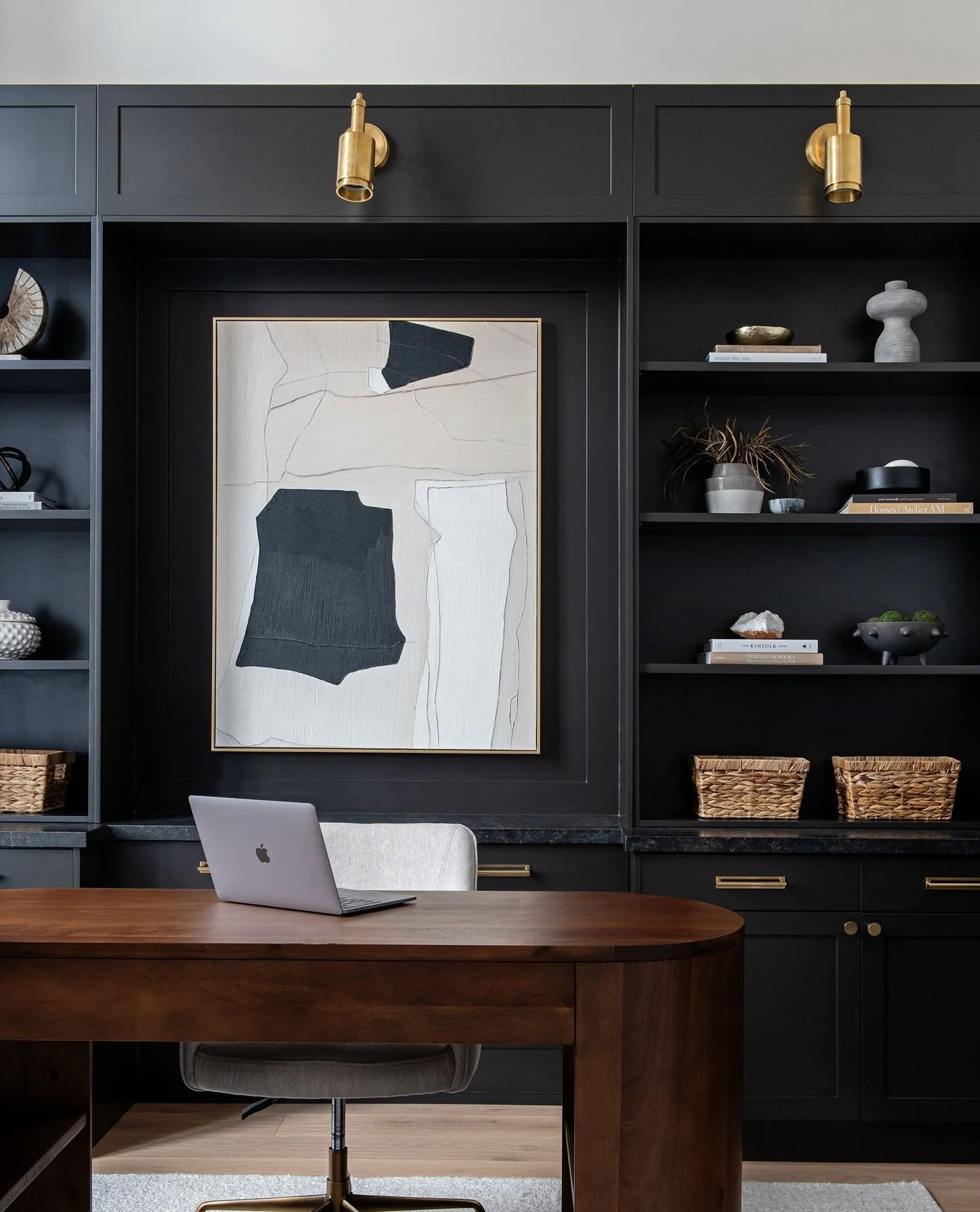 12. Modern Art-Focused Workspace (Black Office Ideas)