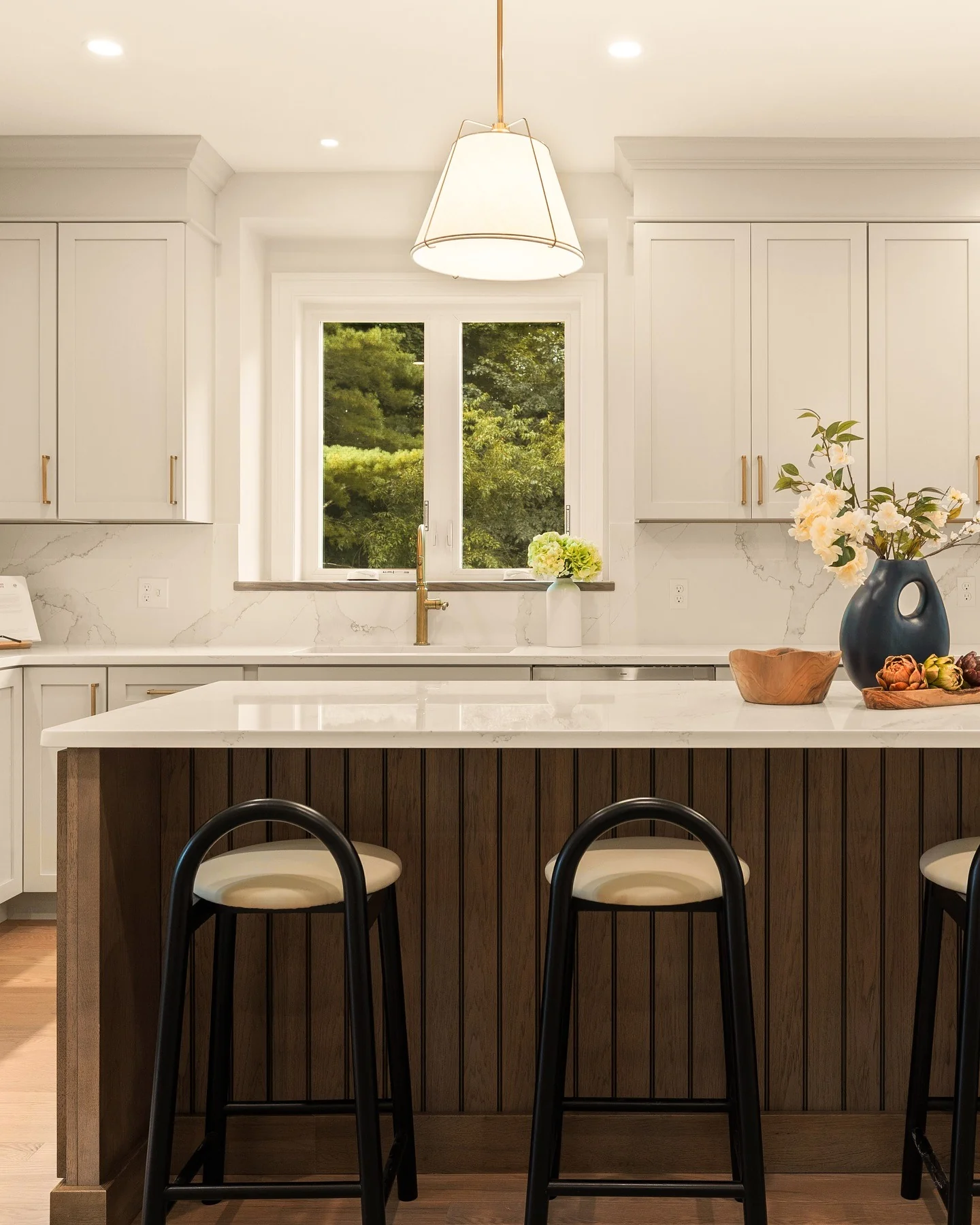 3. Modern Transitional Charm in White and Wood (Kitchen Cabinet Ideas)