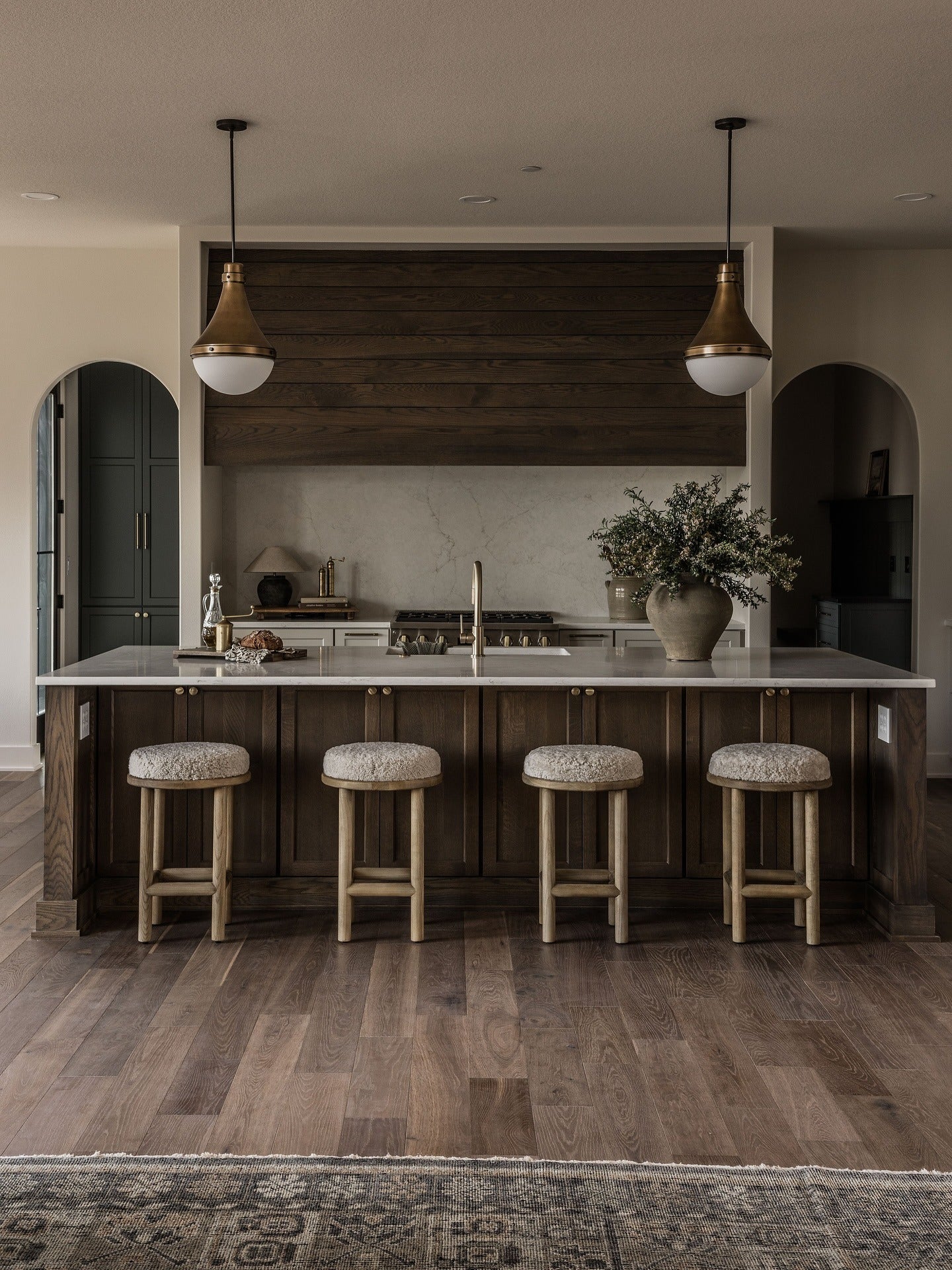 6. Chocolate Oak and Brass Sophistication (Countertop Ideas for Kitchen)