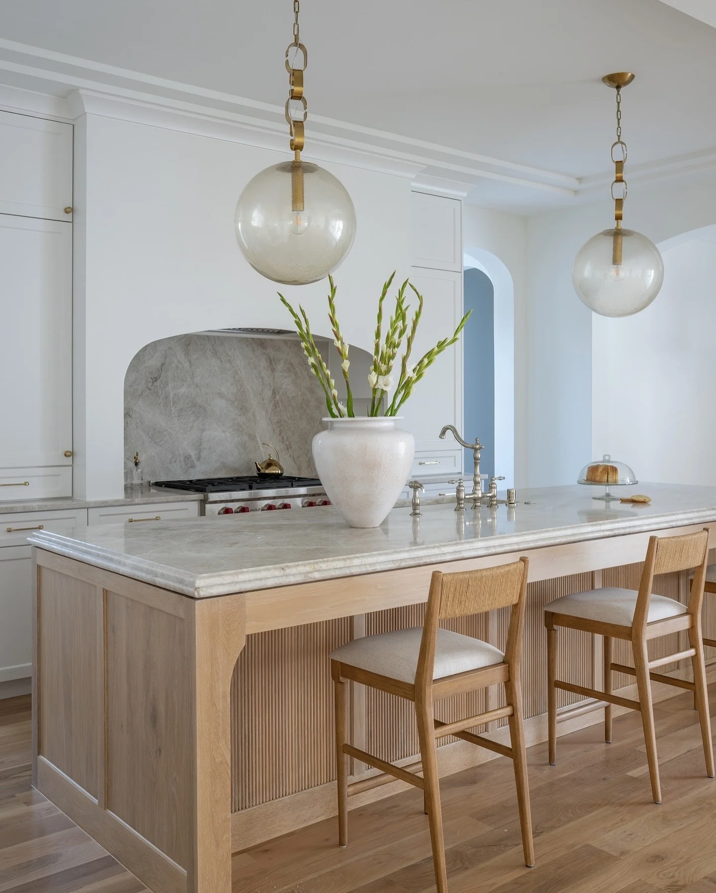 10. Soft Oak and Calacatta Marble Grandeur (Countertop Ideas for Kitchen)