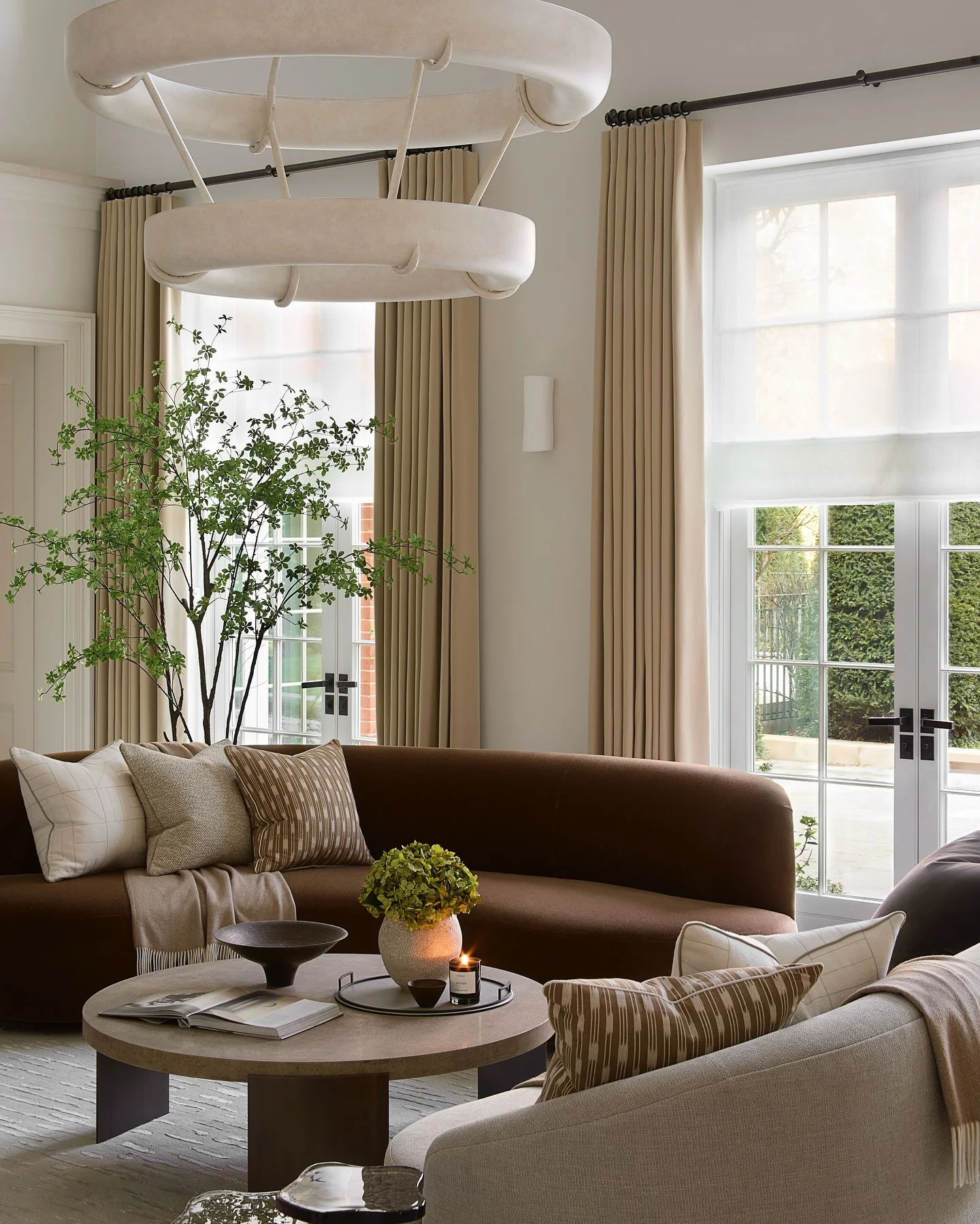 10. Tailored Neutrals with Sculptural Grace (Unique Living Room Ideas)