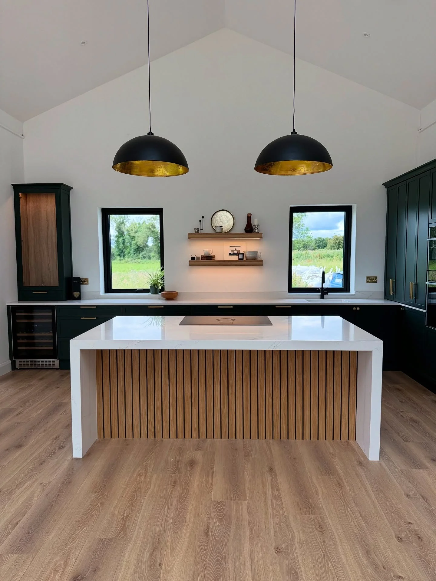 6. Minimal Luxe with Deep Green and Gold (Kitchen Lighting Ideas)