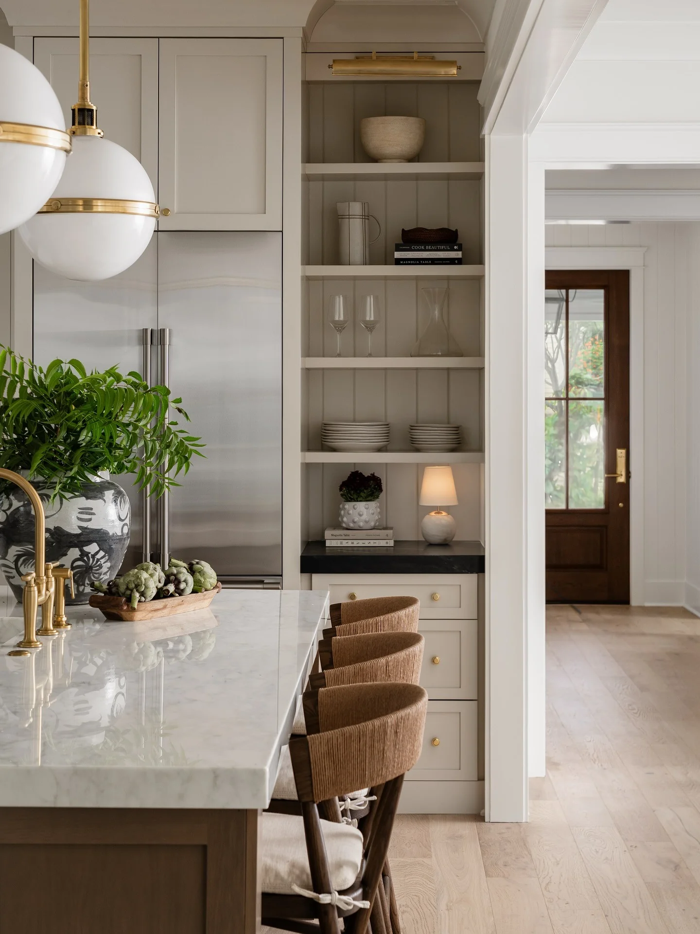 14. Modern Classic with Marble and Brass Details (Kitchen Lighting Ideas)