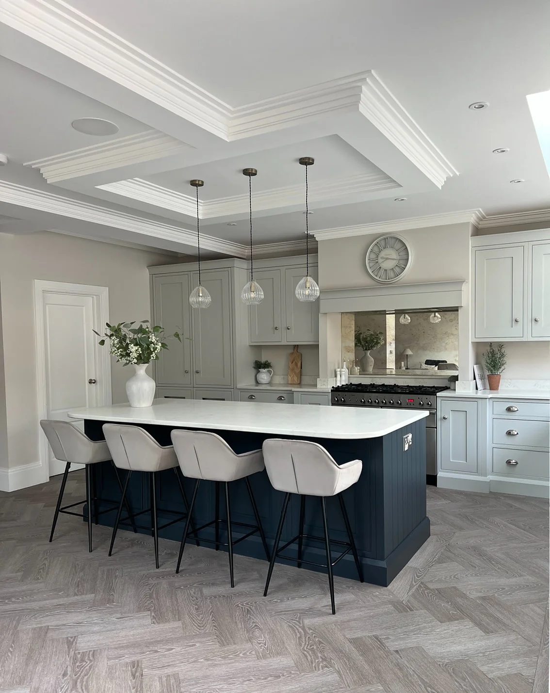 11. Classic Contrast with Midnight Blue Elegance (Kitchen Lighting Ideas)