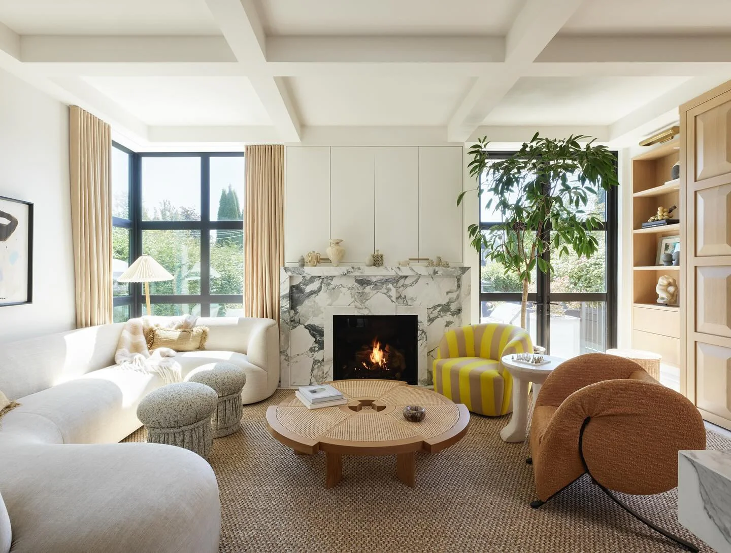 5. Contemporary Comfort in Earthy Neutrals and Soft Gold (Aesthetic Living Room Ideas)