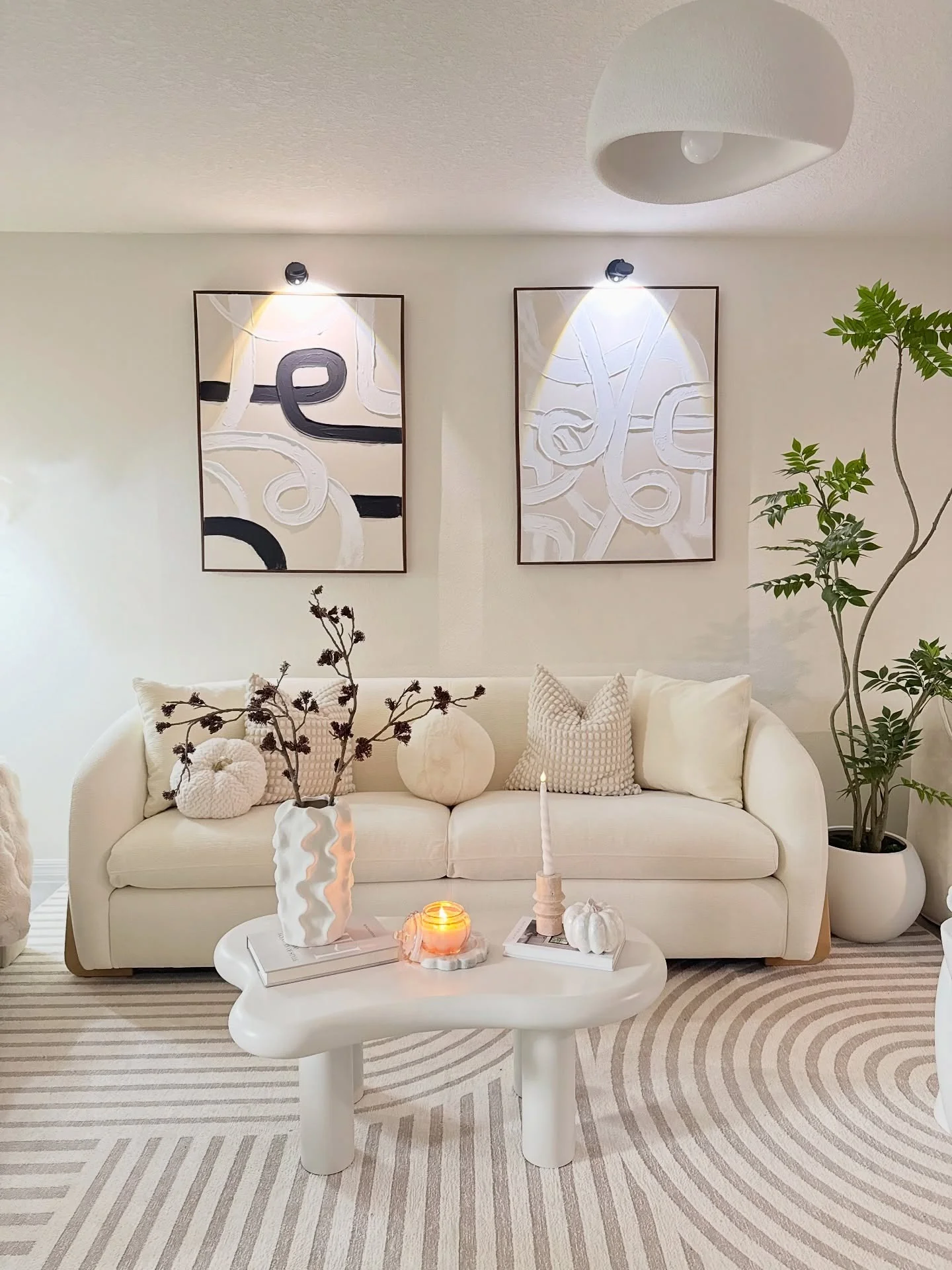 10. Minimal Organic Design in Cream and Textured White (Aesthetic Living Room Ideas)