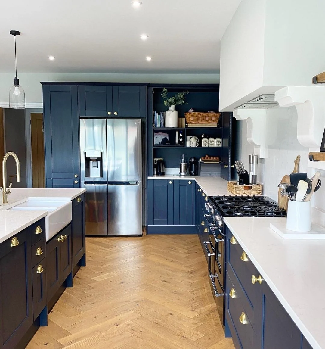 9. Refined Classic with Gold Hardware Detailing (Dark Blue Kitchen Ideas)