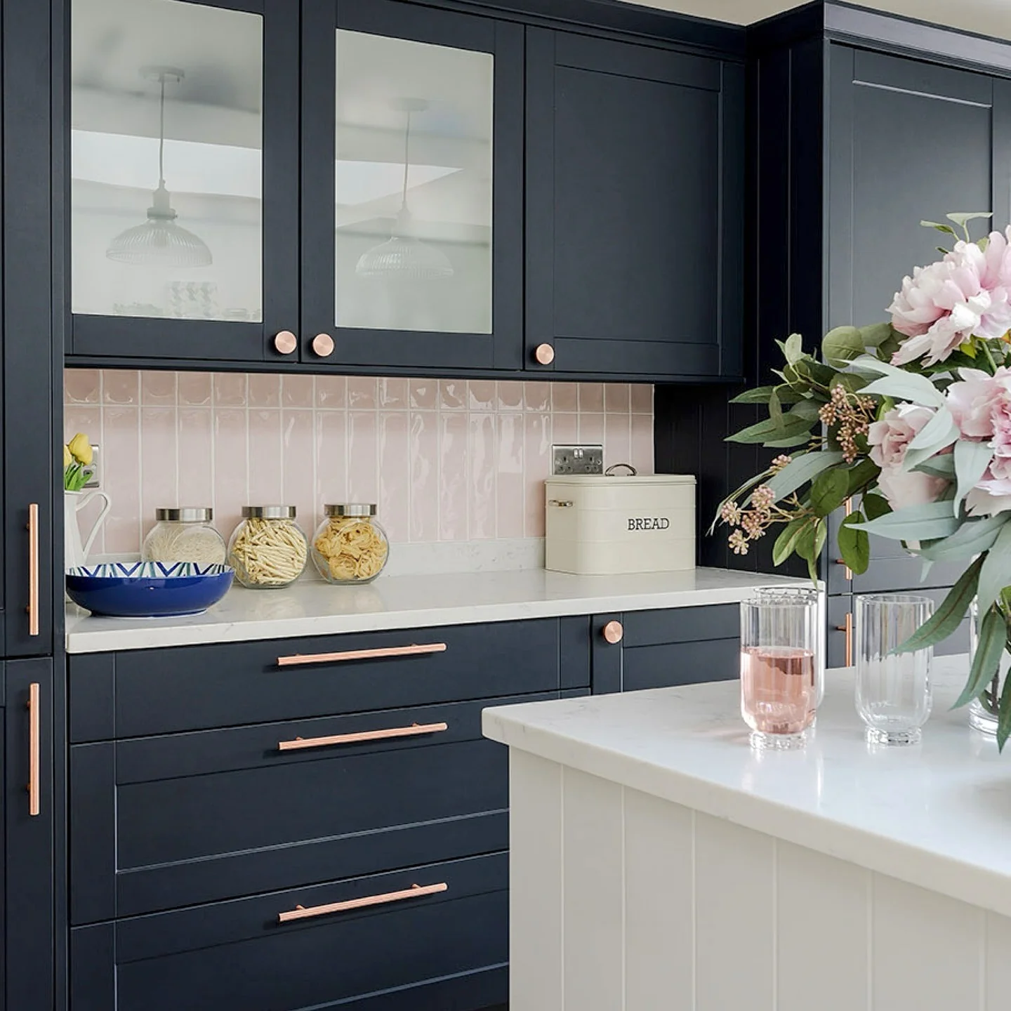 15. Navy and Blush Harmony with Rose Gold Details (Dark Blue Kitchen Ideas)