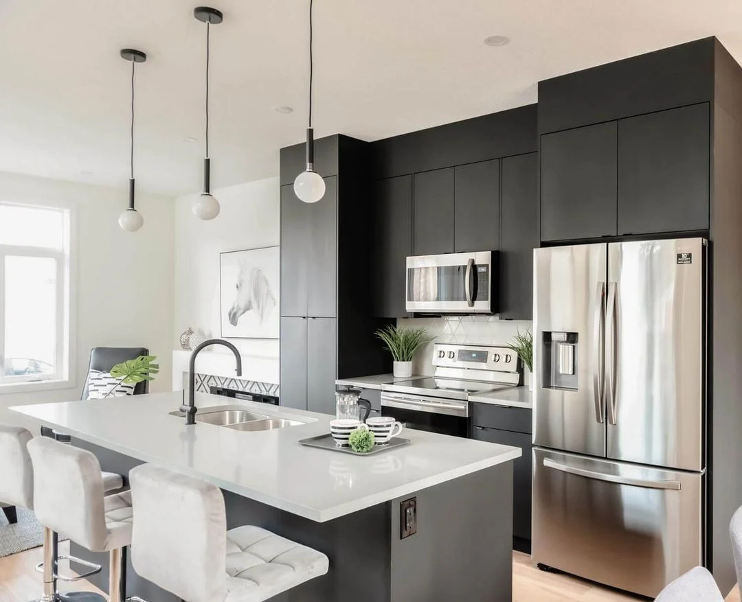 11. Monochrome Modern with Chrome Precision (Contemporary Kitchen Ideas)