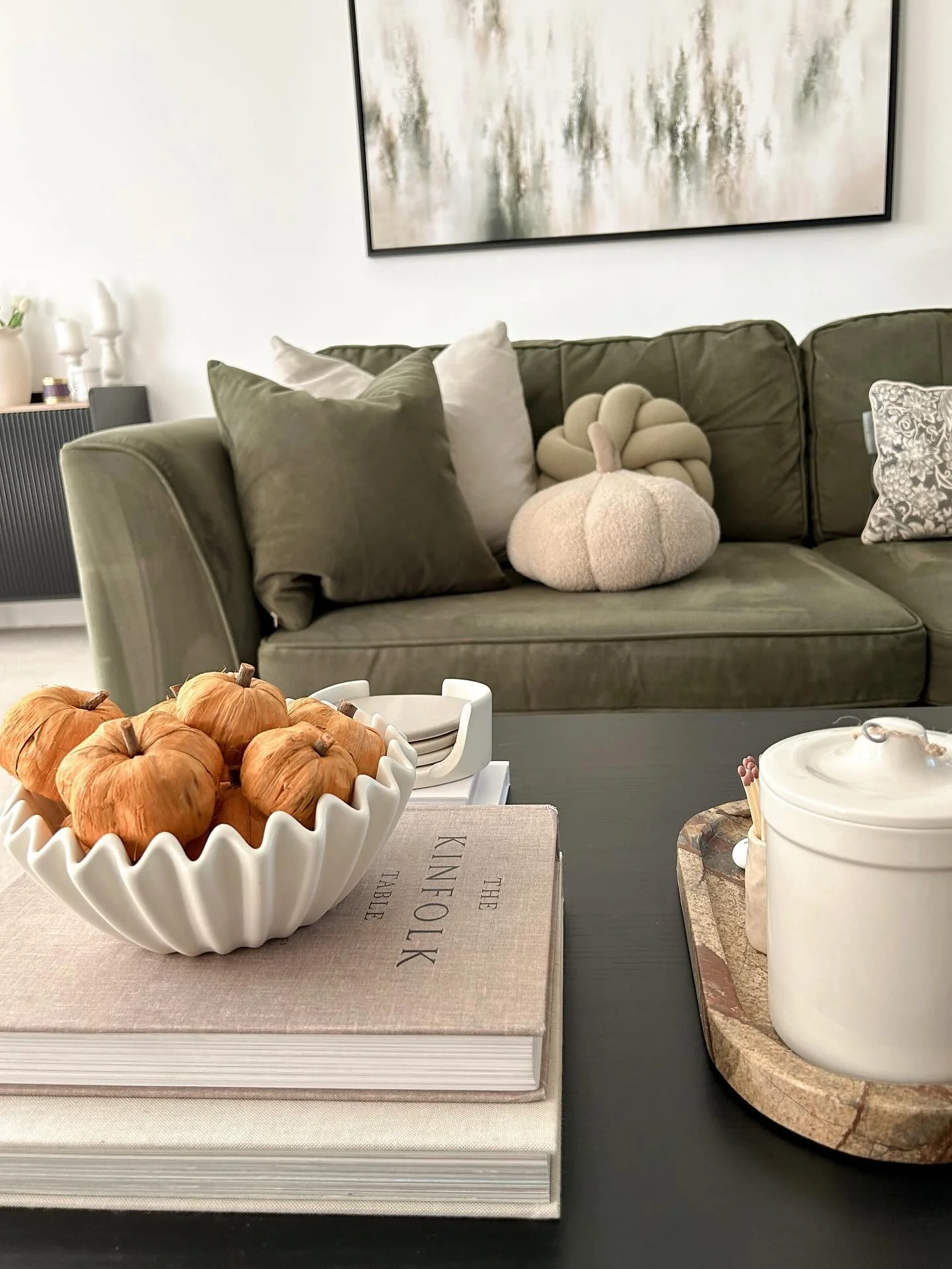 2. Olive Green Comfort with Natural Touches (Fall Living Room Decor Ideas)